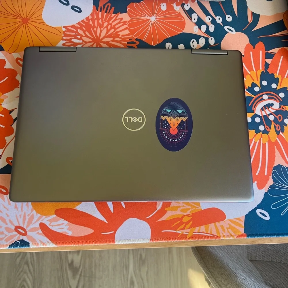 Dell Inspiron 13 7000 2in1 laptop. Converts to tablet and is touchscreen.